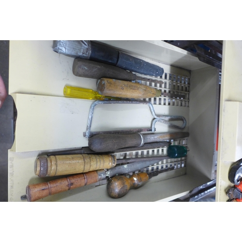 2025 - A 6 section tool trolley with a quantity of hand tools including hammer, saw, chisels and files, dri... 