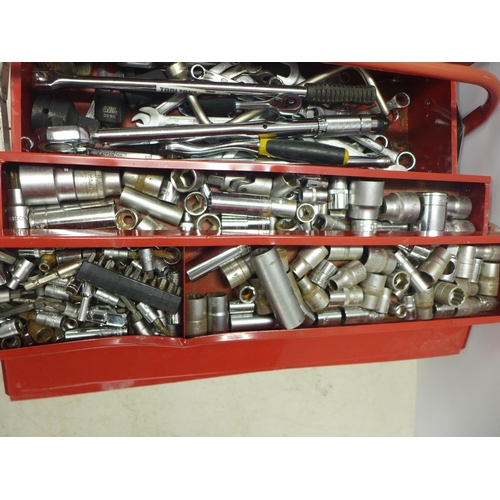 2036 - A red metal cantilever tool box of sockets and spanners