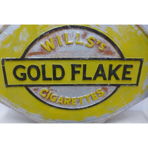 2047 - A large cast metal Wills's Gold Flake cigarettes wall sign - damaged