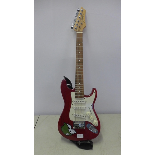 2052 - An Elevation Strat style electric guitar and a Johnson ¾ size Strat style electric guitar