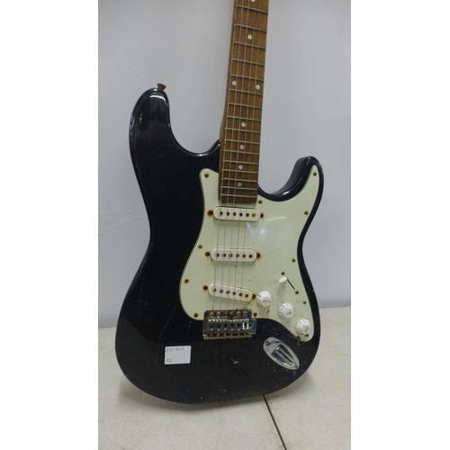 2052 - An Elevation Strat style electric guitar and a Johnson ¾ size Strat style electric guitar