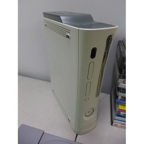 2060 - A PlayStation 1 with one PlayStation 1 controller, an Xbox 360 with 60GB HDD, 2 power supplies and 2... 