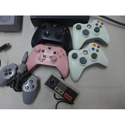 2060 - A PlayStation 1 with one PlayStation 1 controller, an Xbox 360 with 60GB HDD, 2 power supplies and 2... 