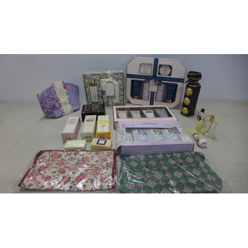 2076 - A box of assorted cosmetics gift sets including Baylis and Harding, Yardley, Next etc.