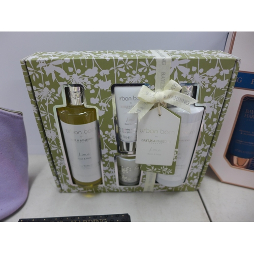 2076 - A box of assorted cosmetics gift sets including Baylis and Harding, Yardley, Next etc.