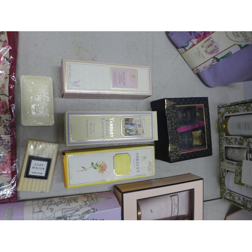 2076 - A box of assorted cosmetics gift sets including Baylis and Harding, Yardley, Next etc.