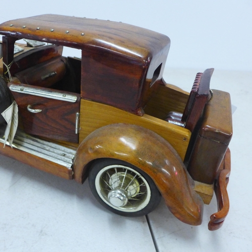 2088 - A wooden model of a vintage car