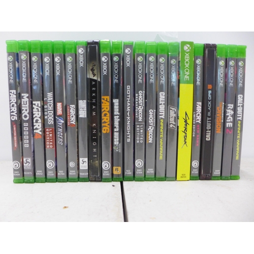 2089 - An Xbox One X console (model 1787) with media remote, matt black remote, headset stand and 21 games ... 