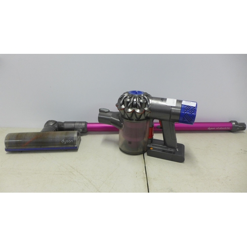 2094 - A Dyson V6 Absolute cordless stick vacuum cleaner with attachments