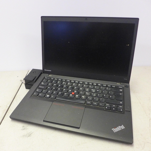 2095 - A lenovo Thinkpad T4405 laptop with lockable dock and power cable - no O/S installed