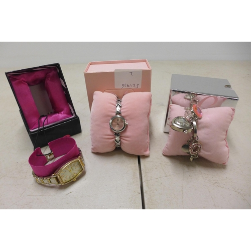 2097 - 2 Women's Lipsy wristwatches and a Playboy wristwatch