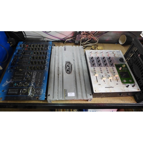 2114 - A Korg KM-402 Dynamic D J mixer, an American Legacy LA2060 2-channel Bridgeable Mosfet amplifier and... 