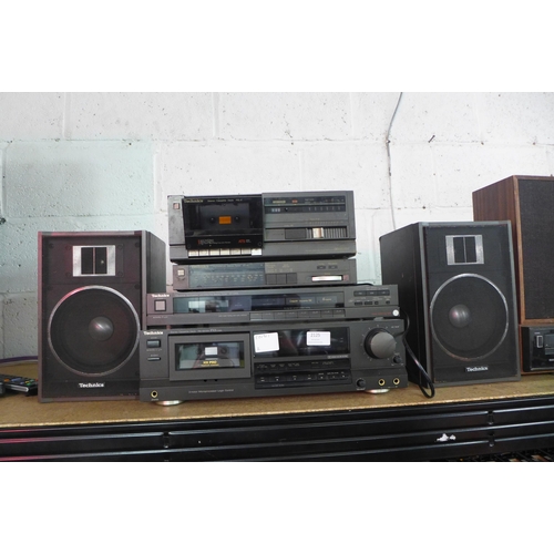 2125 - Technics stereo equipment including an ST-4L FM/MW/LW stereo tuner, an RS-4 stereo cassette deck, an... 