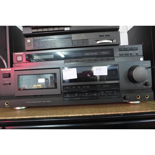 2125 - Technics stereo equipment including an ST-4L FM/MW/LW stereo tuner, an RS-4 stereo cassette deck, an... 