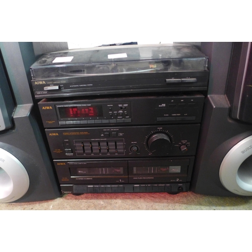 2131 - Aiwa stereo equipment including a PX-ESS automatic turntable system, a three band quartz synthesized... 