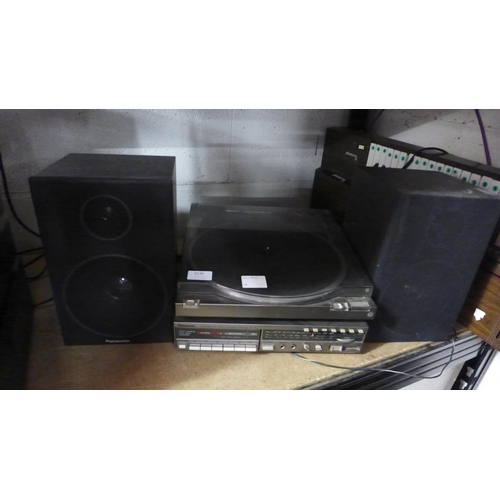 2136 - Panasonic stereo equipment including an SL-N5 DC servo/automatic turntable record player, an SG-14L ... 