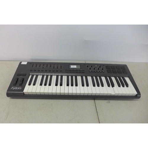 2149 - An M-Audio AX10M 49 49-key midi keyboard and an M-Audio SP-Z Universal sustain pedal