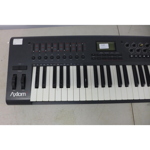 2149 - An M-Audio AX10M 49 49-key midi keyboard and an M-Audio SP-Z Universal sustain pedal