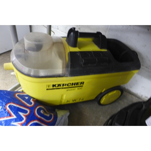 2160 - A Wickes Wet/Dry 20C 1250w vacuum cleaner with accessories and a Karcher Puzzi 100 steam cleaner