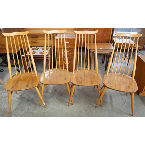 1 - A set of four Ercol Blonde elm and beech Goldsmith chairs