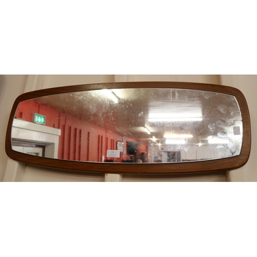 11 - A teak framed mirror