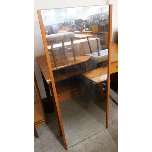 17 - A teak framed mirror