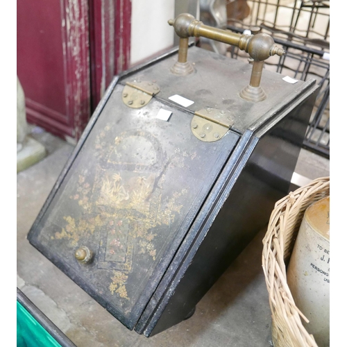 284 - A Victorian ebonised and brass mounted coal scuttle