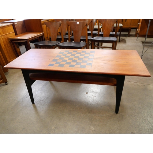 46 - A Danish teak two tier coffee table