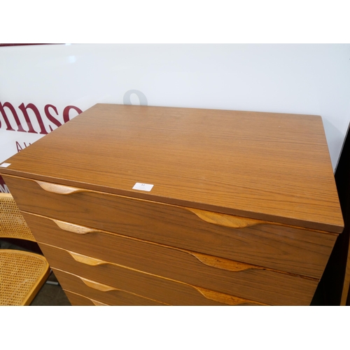 51 - A Europa teak chest of drawers