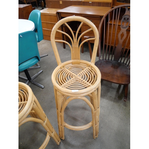 58 - A pair of Italian style bamboo bar stools