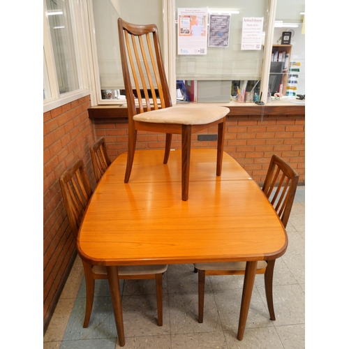 6 - A G-Plan Sierra teak extending dining table and four G-Plan Fresco chairs