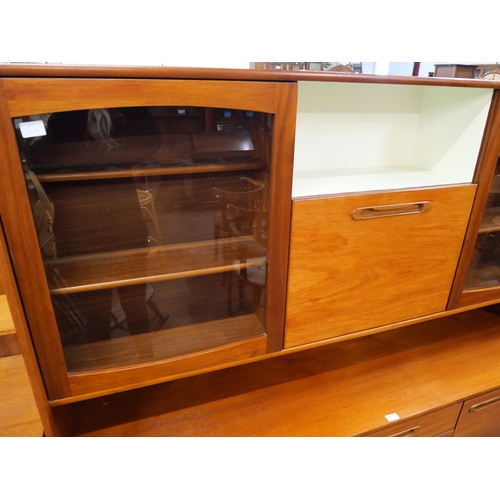 60 - A teak highboard