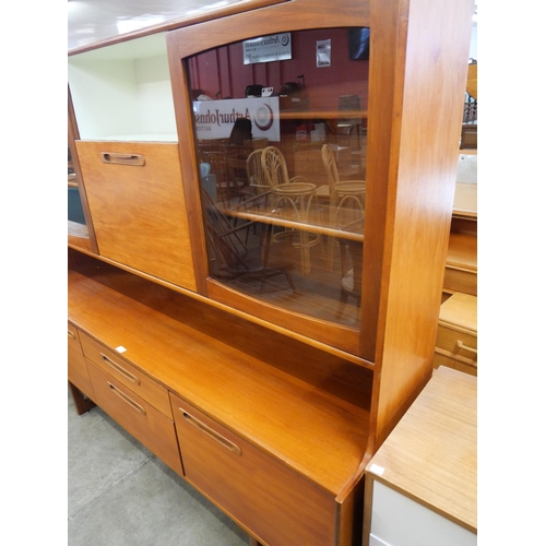 60 - A teak highboard