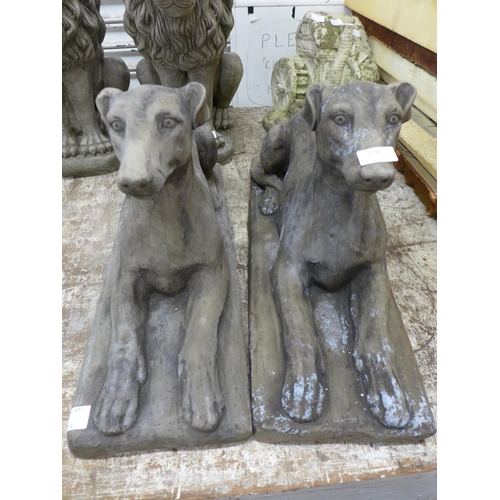 2197 - A pair of stone effect concrete greyhound garden ornaments - approximately 40kg each