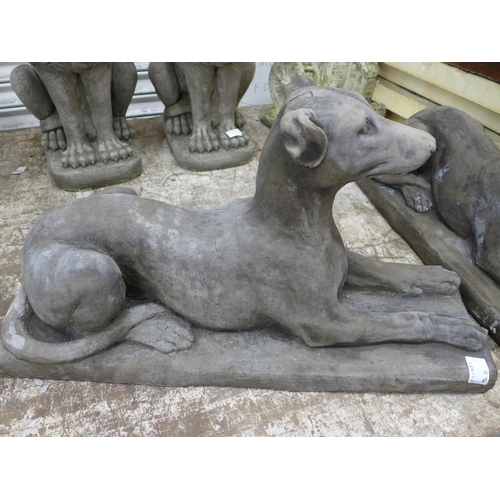 2197 - A pair of stone effect concrete greyhound garden ornaments - approximately 40kg each