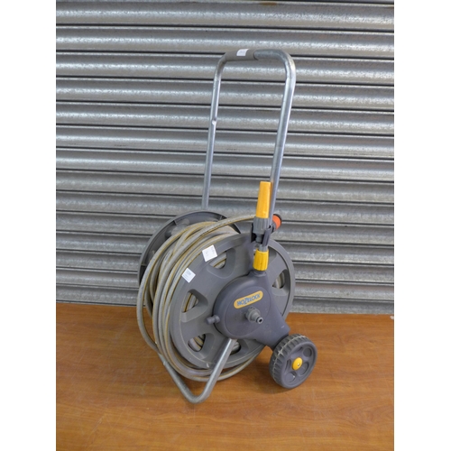 2199 - A Hozelock hose pipe and trolley reel