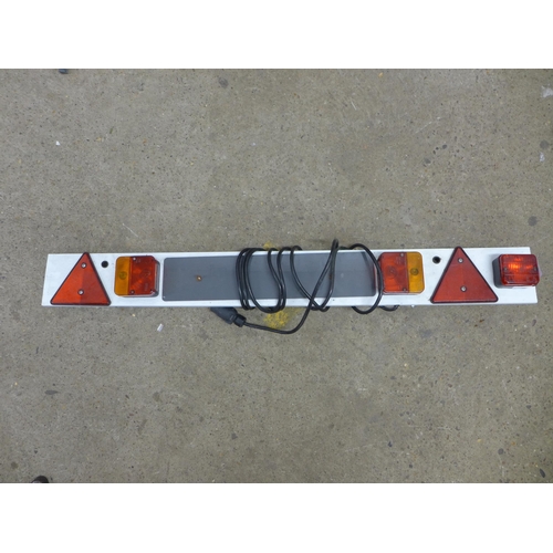 2220 - A 4ft trailer board with power hook up