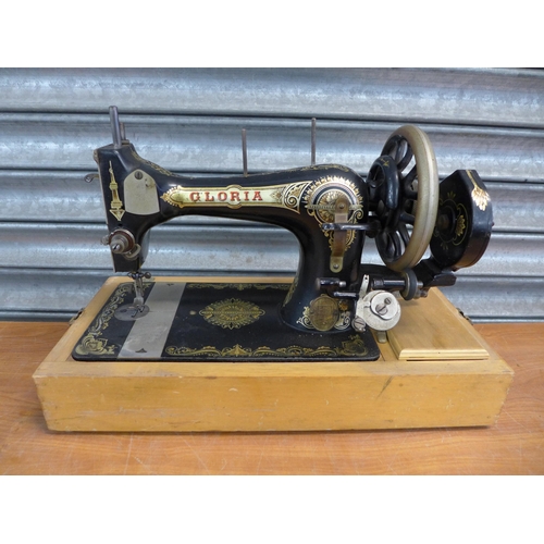 2297 - A vintage Gloria (988156) sewing machine with hard case