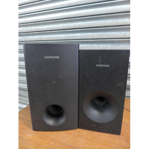 2299 - A Samsung HWV355 sound bar, Samsung HT-Z320R/XEU DVD player and Samsung surround sound speakers incl... 