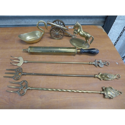 2300 - A box of assorted brassware, mantel clocks, glassware, fireplace tools etc.