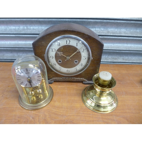 2300 - A box of assorted brassware, mantel clocks, glassware, fireplace tools etc.