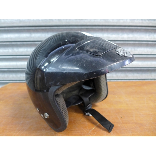 2302 - A Harley-Davidson motorcycle helmet and a BMX life helmet