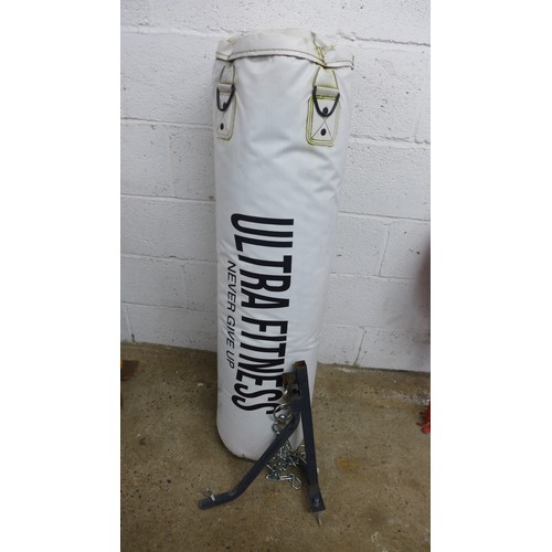 2384 - An Ultra Fitness punch bag with bracket