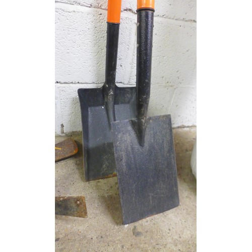 2385 - 4 Assorted gardening tools; 2 spades and two flat picks