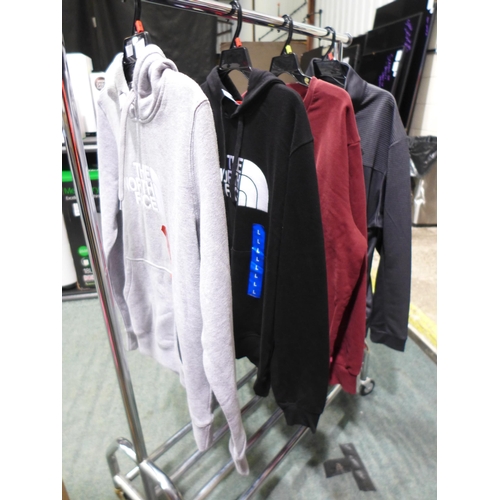 3228 - Four branded tops inc, North Face, Levi and Callaway - Mixed sizes. *This lot is subject to VAT