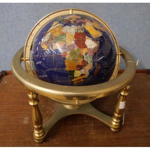 369 - A faux gemstone terrestrial globe on gilt metal stand