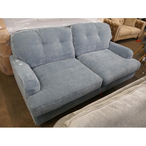 1461 - A steel blue velvet three seater sofa RRP £949