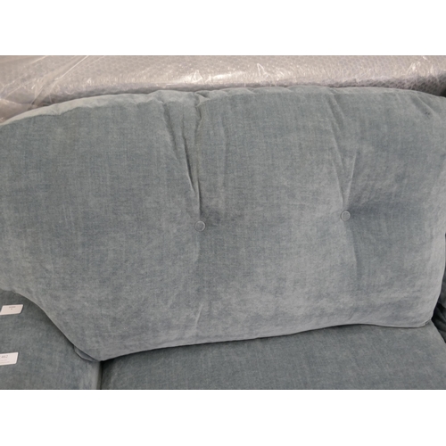 1461 - A steel blue velvet three seater sofa RRP £949