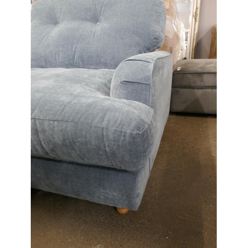 1461 - A steel blue velvet three seater sofa RRP £949