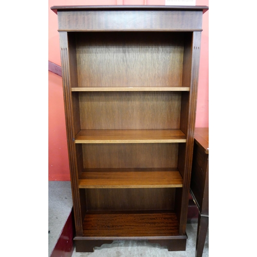 121 - A George III style mahogany open bookcase